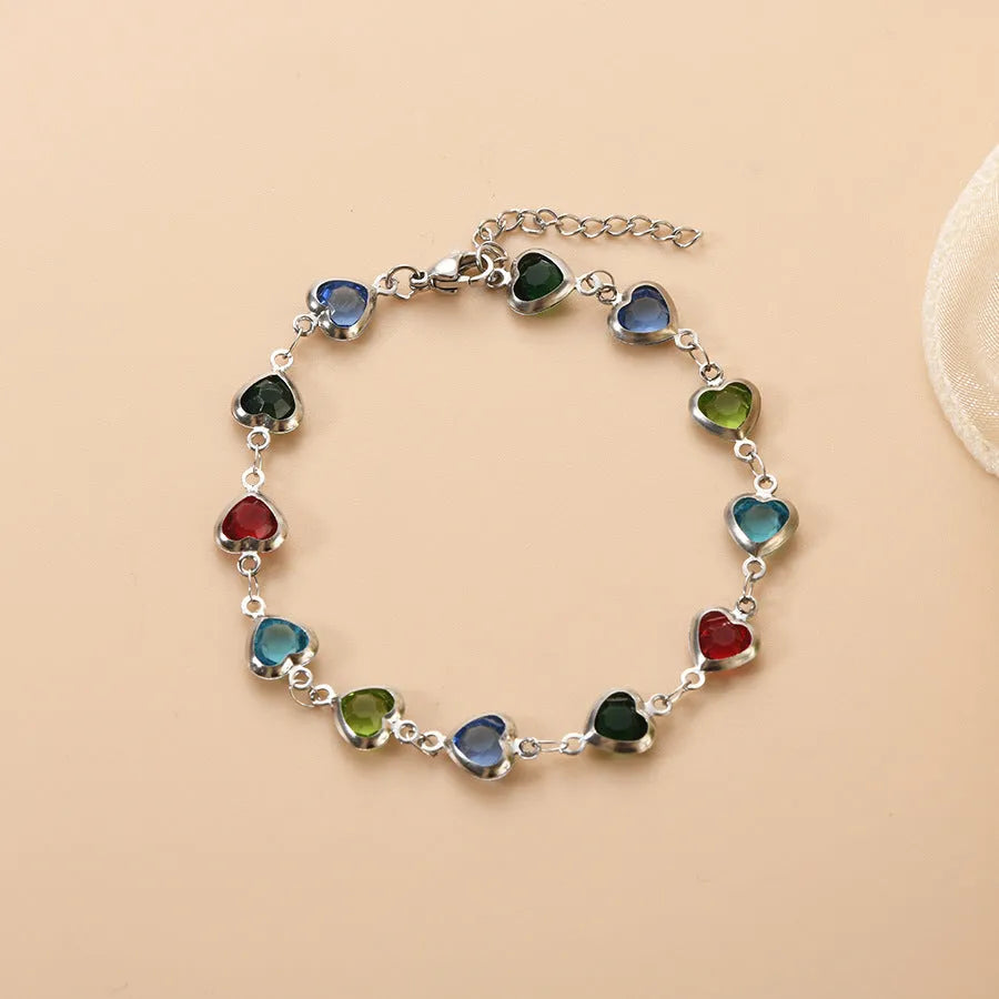 Geometric heart bracelet with colourful electroplated finish on stainless steel, unisex design