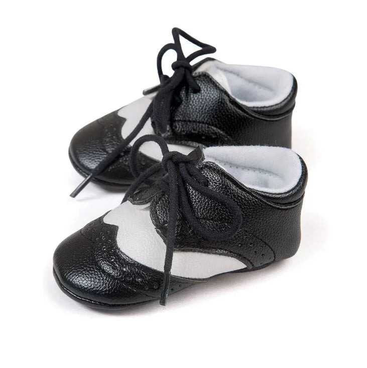 Men's vintage-style baby walking shoes in synthetic leather, shown in light brown colour.