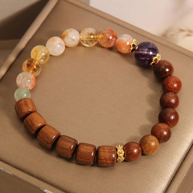 Yellow tower crystal and ebony amethyst women's bracelet with rhinestone details.