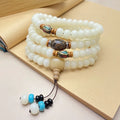 White jade bodhi 108-bead unisex bracelet shown in three different pattern styles.