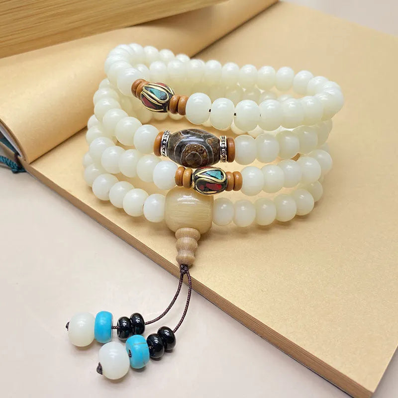 White jade bodhi 108-bead unisex bracelet shown in three different pattern styles.