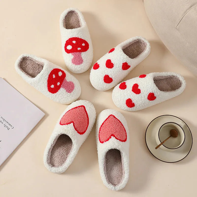 Women's plush home slipper with cartoon graphic print and non-slip PVC sole.