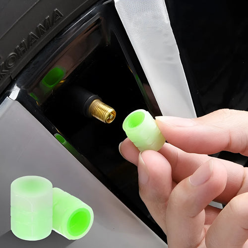 Glow-in-the-dark rubber car tyre valve caps in a set, showing size and luminous feature.