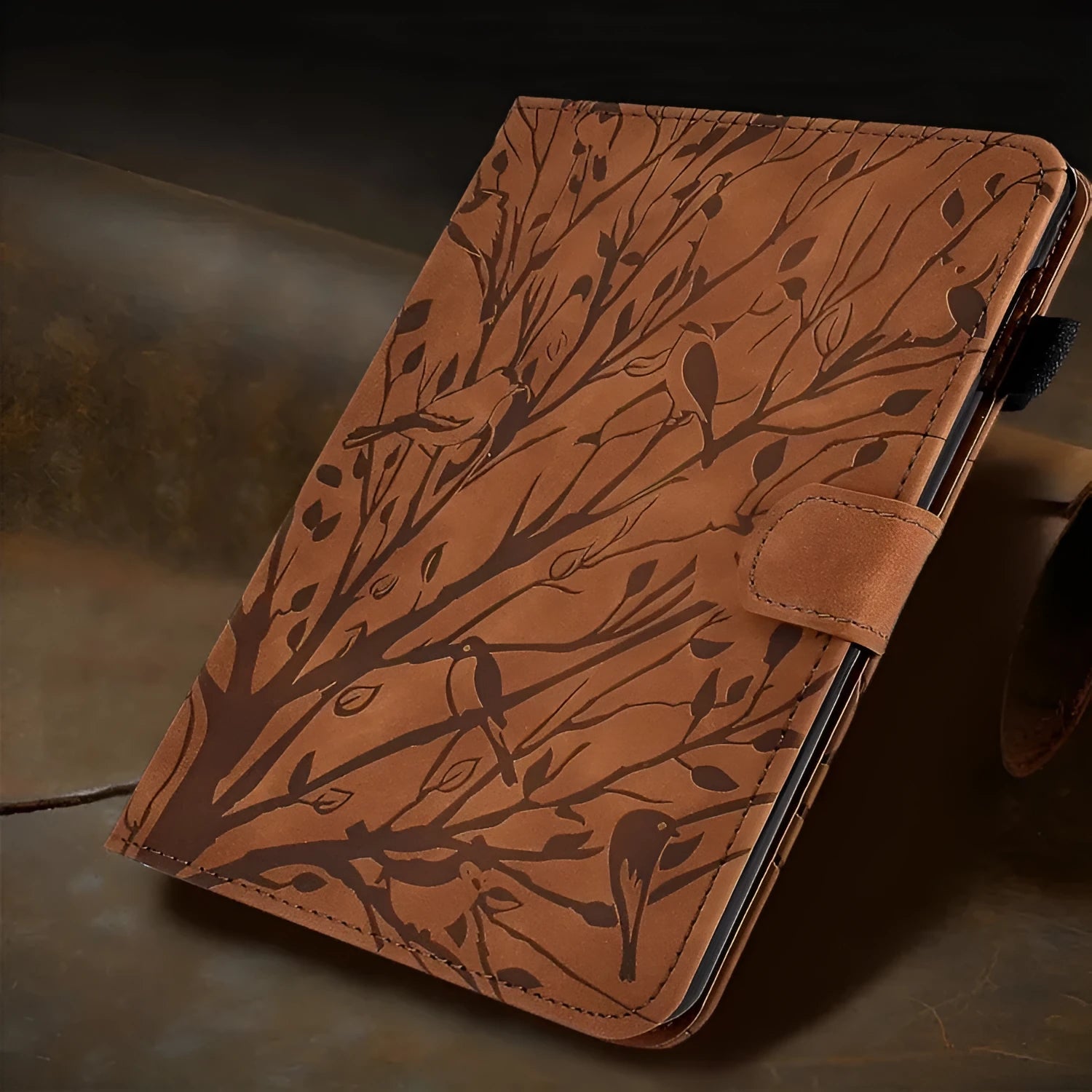 Imitation leather tablet protective case with a folded-out kickstand, shown in khaki colour.