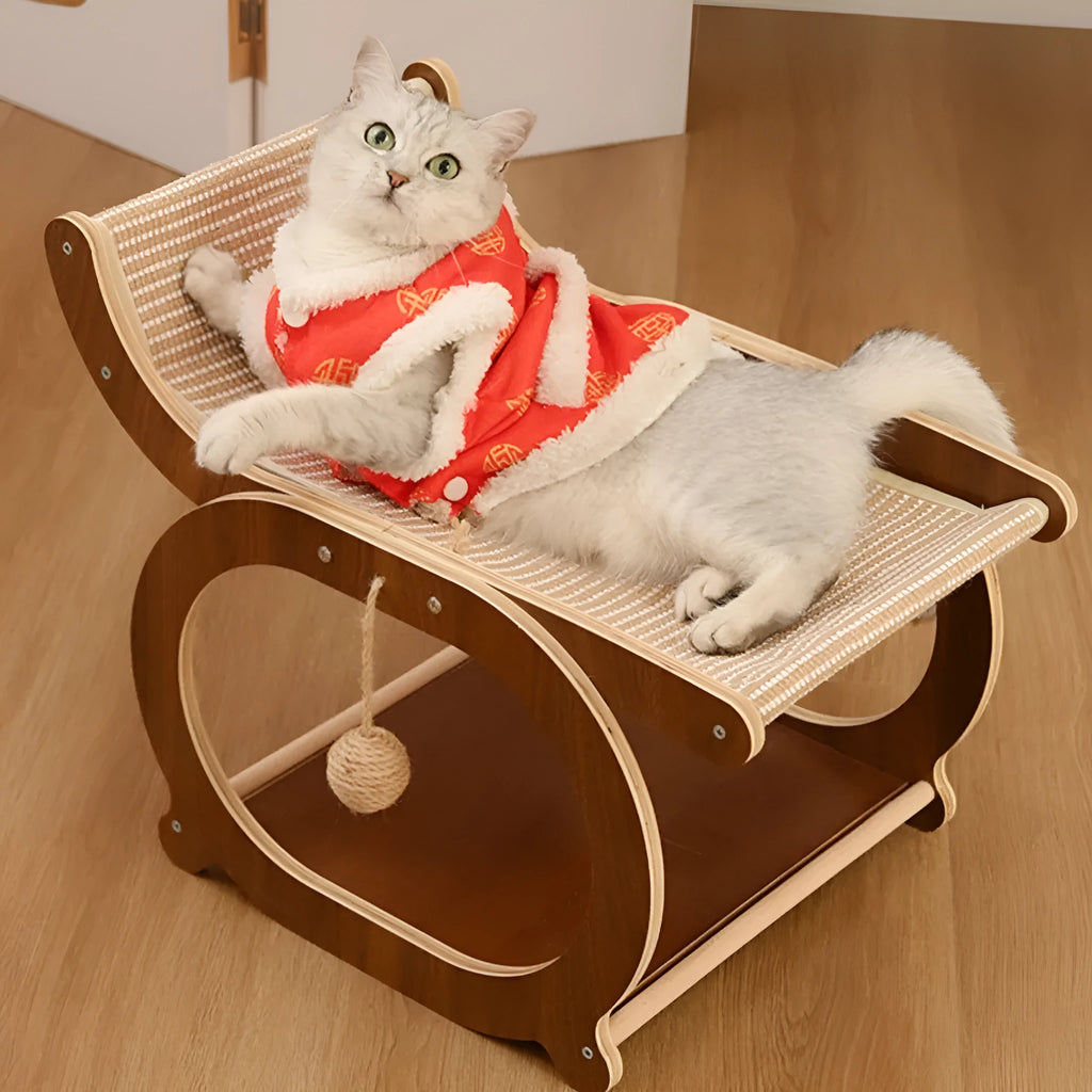 Solid wood frame sisal scratching mat serving as a raised cat bed in a walnut wood finish.