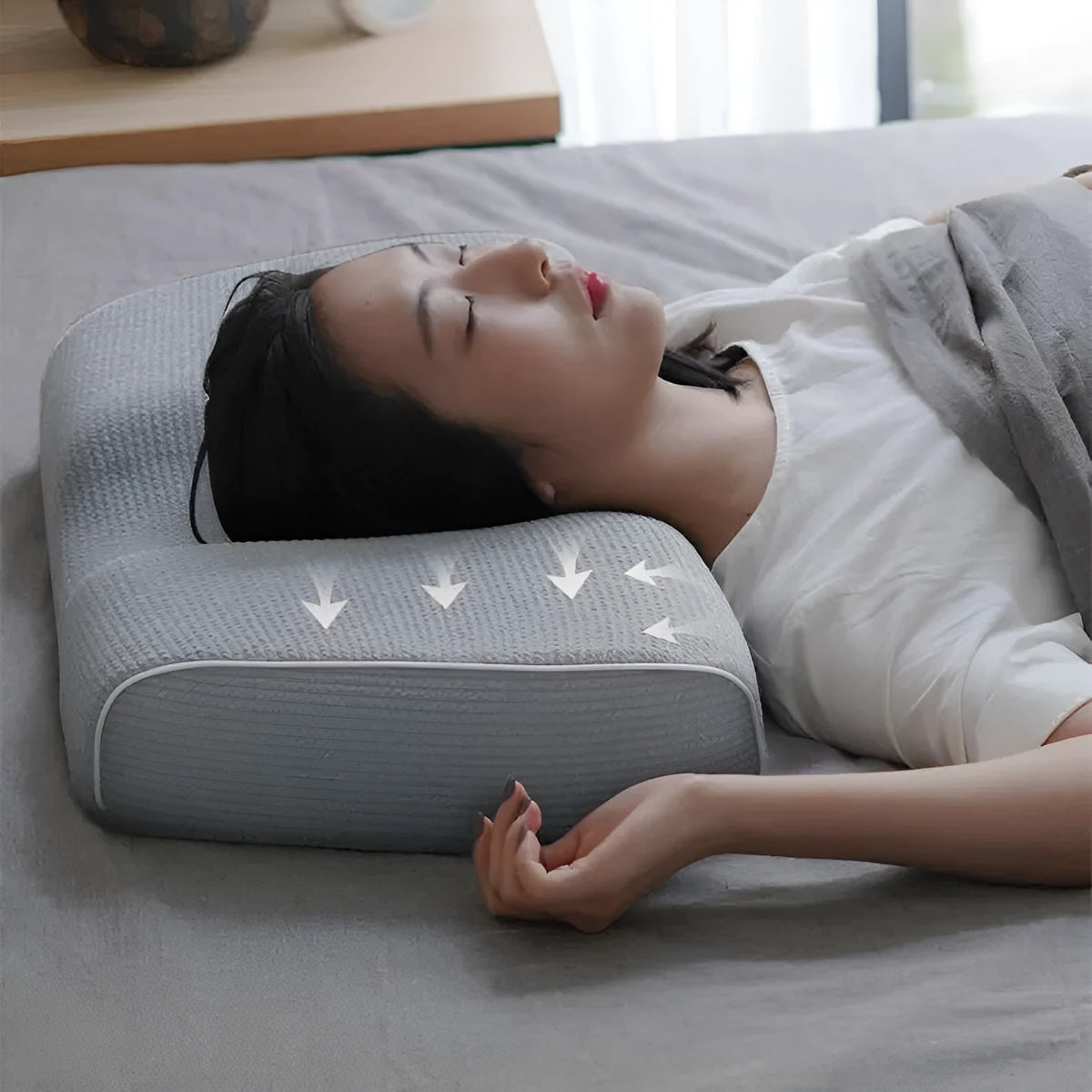 Grey memory foam massage pillow with knitted cotton cover and adjustable loft for neck support