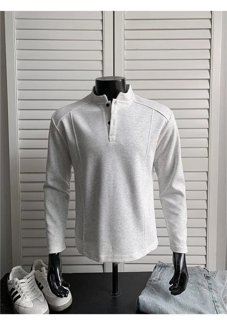 Men's grey asymmetric patchwork polo shirt with a stand-up collar, long sleeves, and a loose fit.