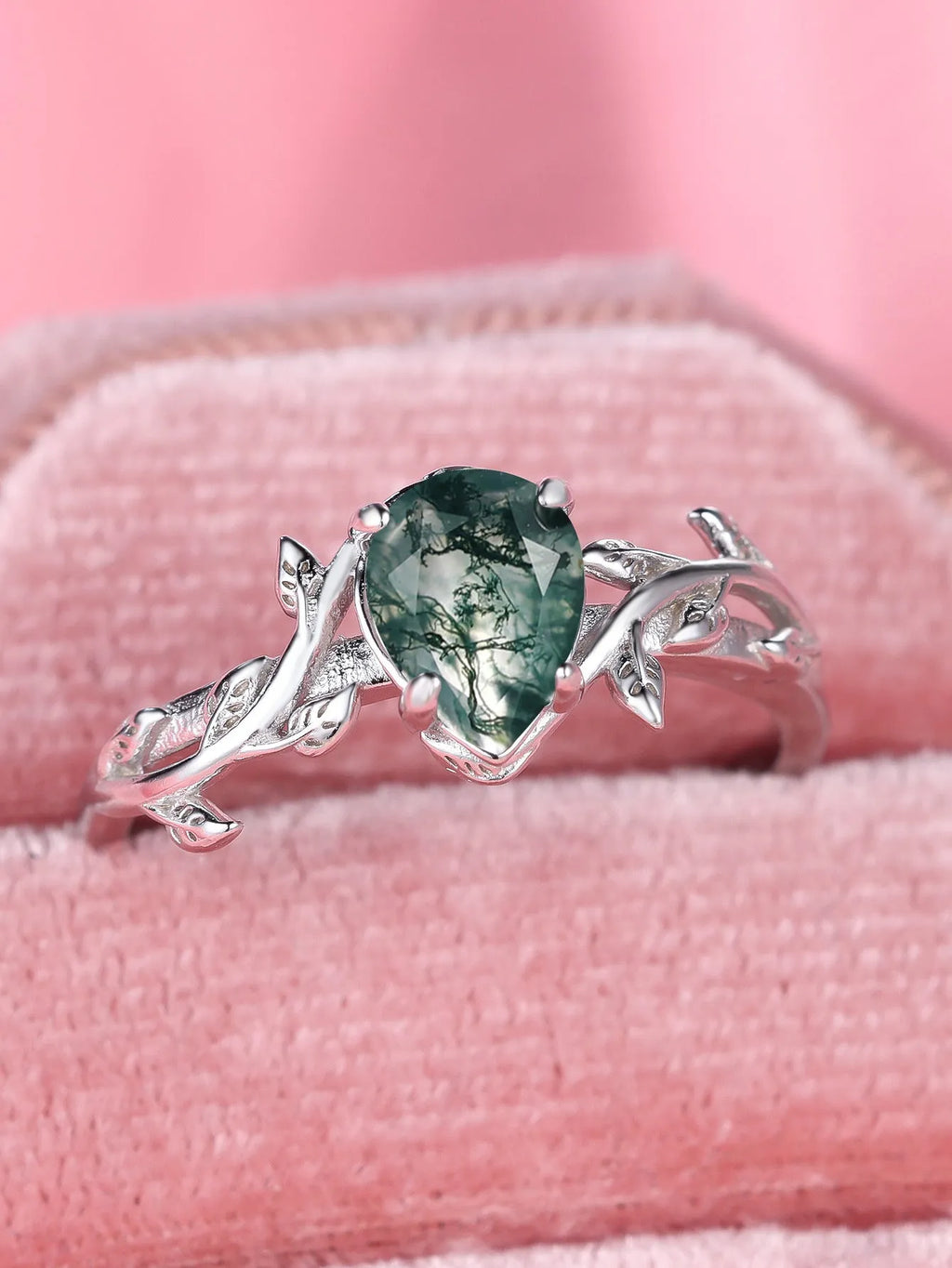 S925 silver ring with drop-shaped natural agate stone and branch leaf edge design on white background