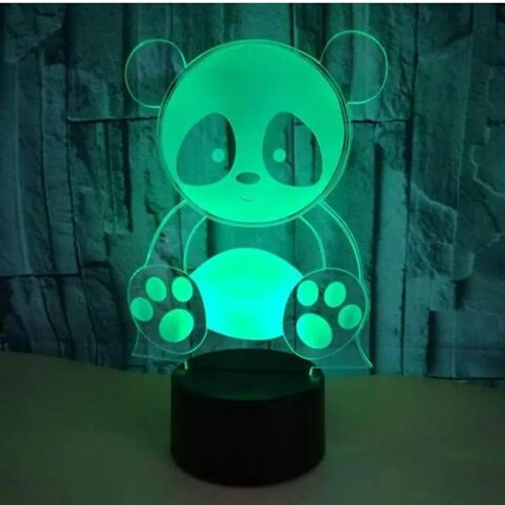 Panda shaped night light with remote control showing seven colour LED illumination