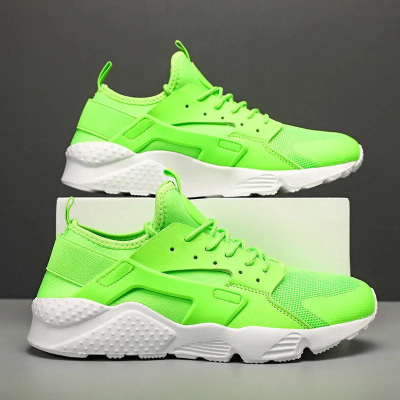 Men's low top mesh sneakers in fluorescent colours on a flat sole