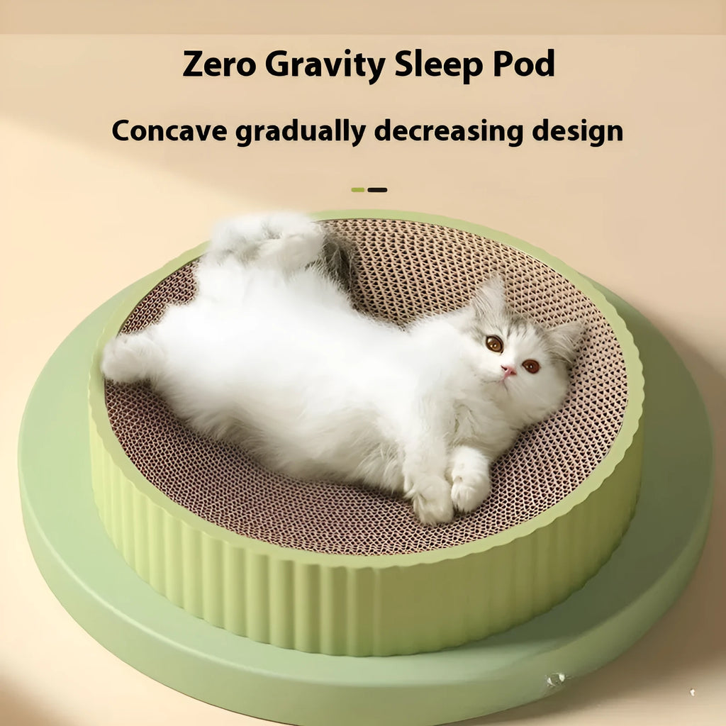 Green and white round cat scratching board measuring 55 cm with two spare corrugated paper refills