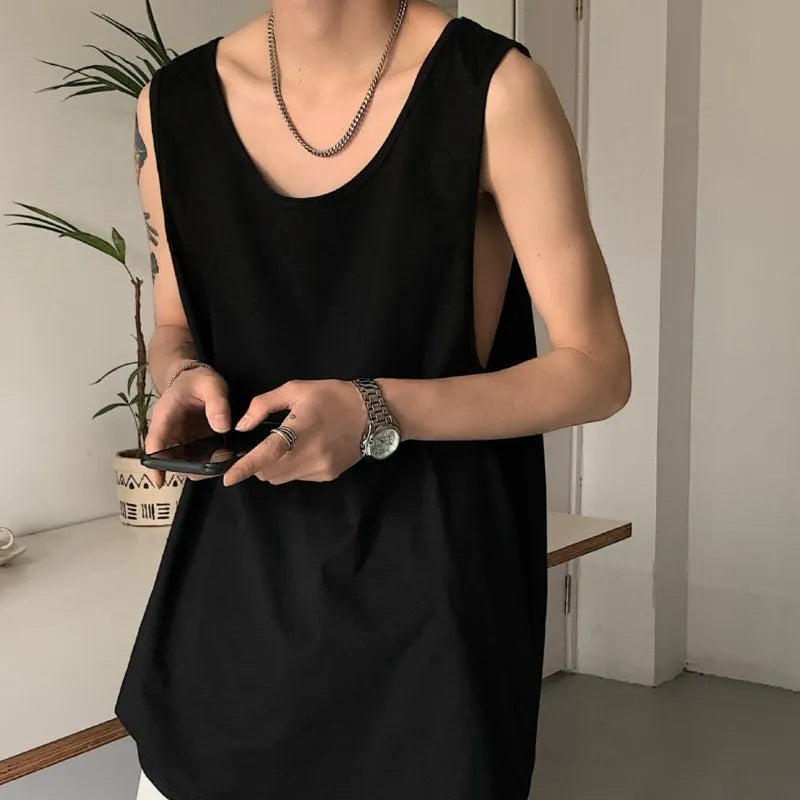 Sleeveless vest in solid colour, loose fit, polyester blend, straight hem, black