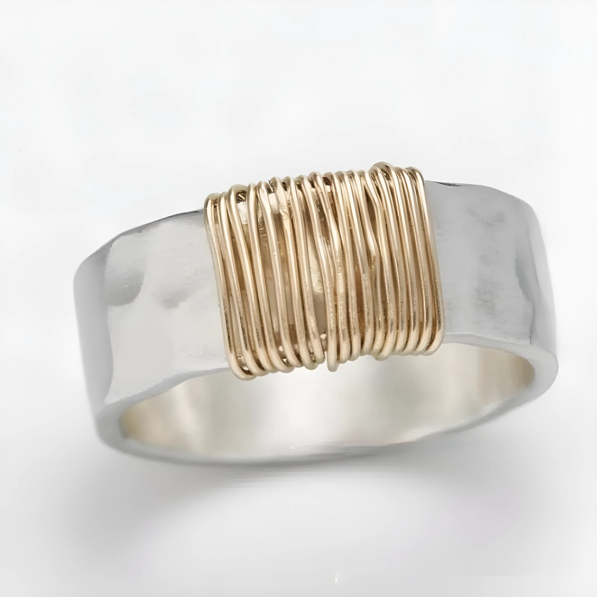 Copper geometric wide ring bracelet with irregular coil design in silver-gold colour.