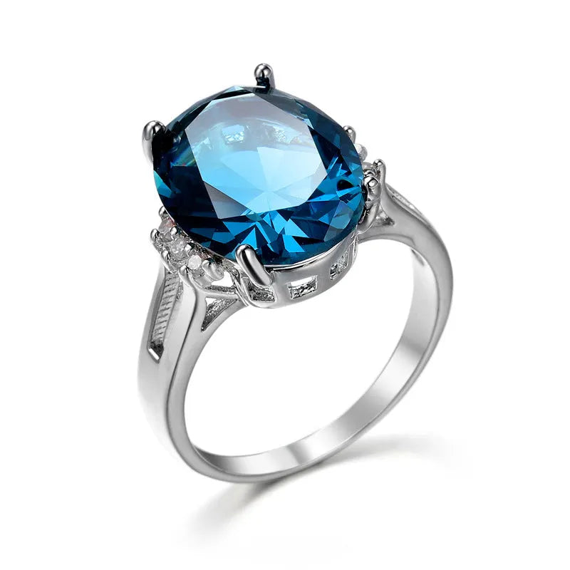 Blue black decorative ring with geometric ellipse shape and electroplated copper finish, unisex style