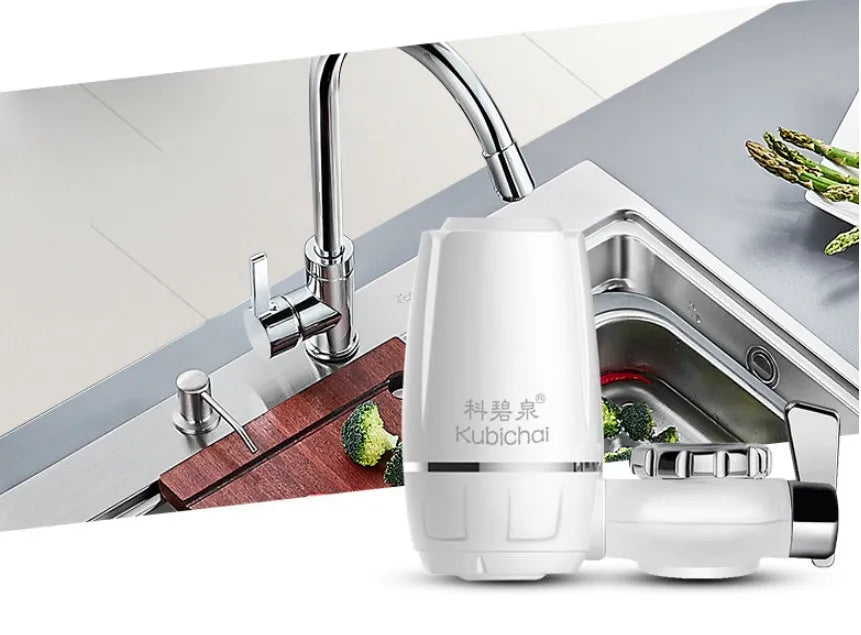 White plastic faucet water filter with ceramic cartridge and universal tap adapter kit.