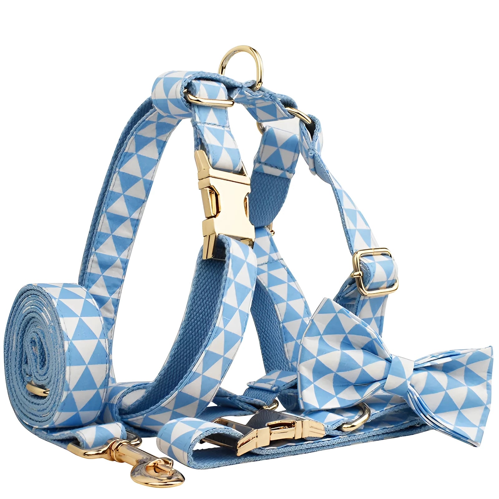 Blue cloth dog collar, lead, bow, and vest set laid out flat showing the four matching pieces.