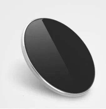 Ultra-thin aluminium wireless charger in metallic finish showing micro USB port