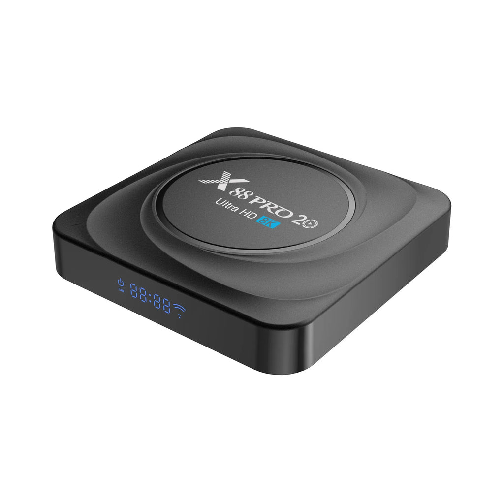 Android set-top TV box with remote control on a wooden surface