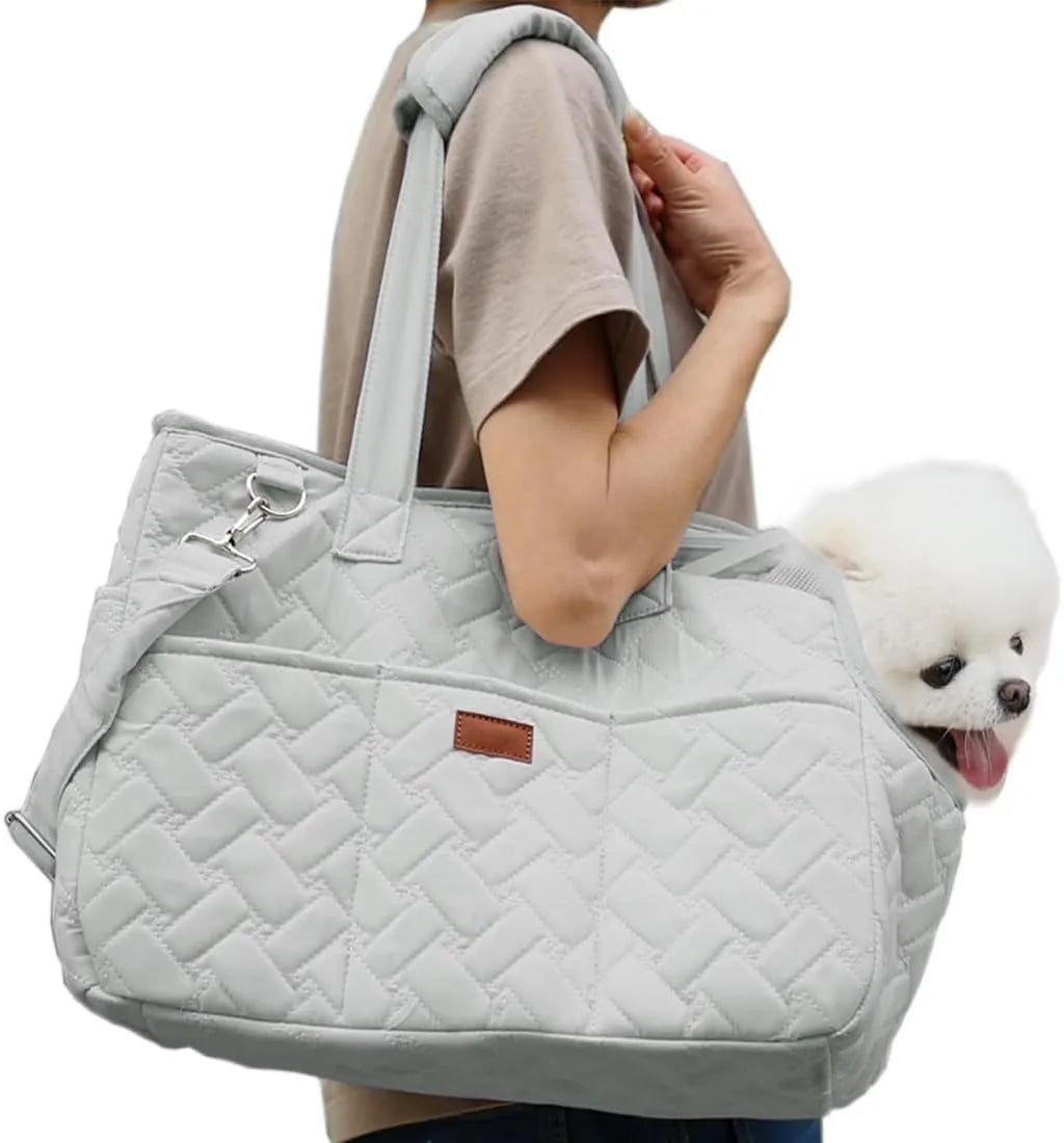 Grey pet carrier handbag with breathable mesh panels and multiple pockets for cat or small dog transport