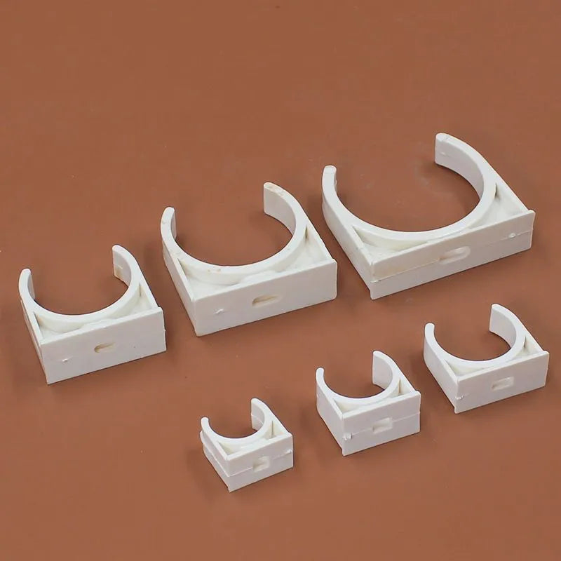 PVC U-shaped plastic pipe clamp in 16mm size, on white background