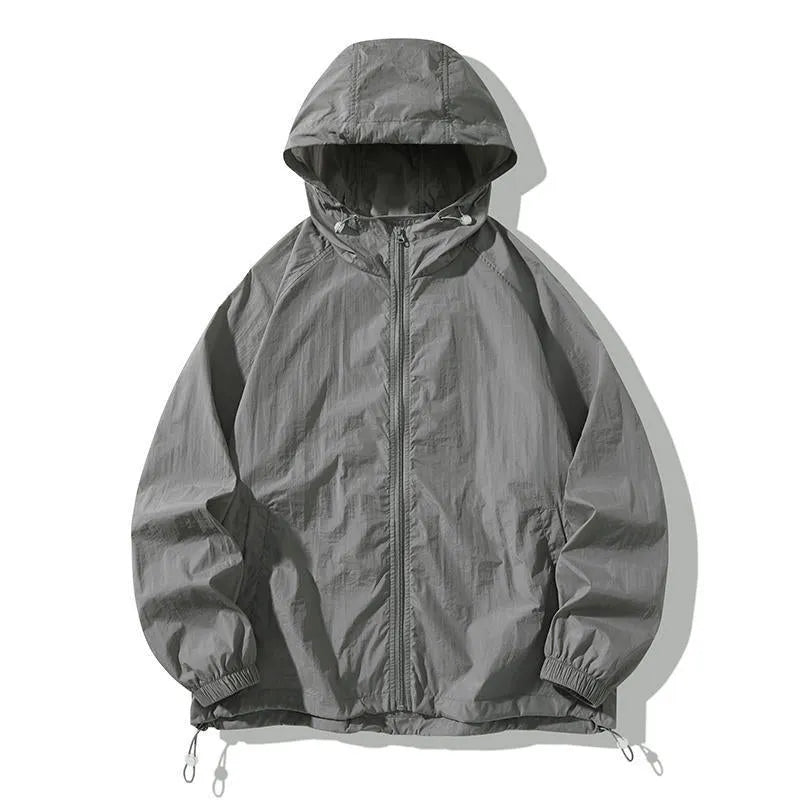 Loose fit unisex outdoor sports jacket in nylon blend fabric on a hanger.