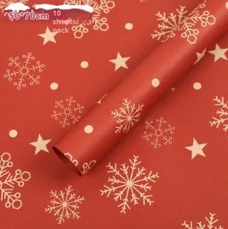 Christmas Kraft paper gift wrap sheets with red and green ink printed cartoon designs including polka dots, snowflakes, and Christmas trees