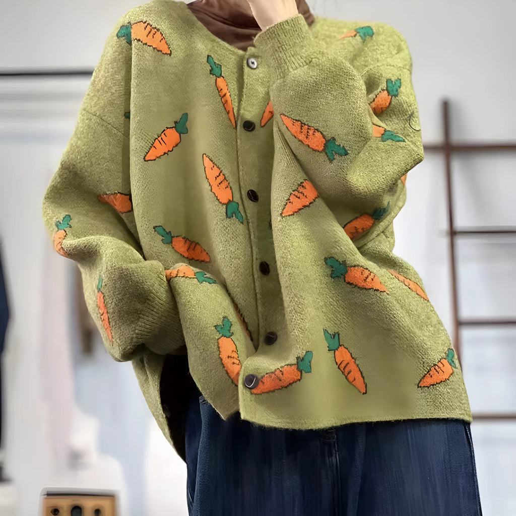 A loose-fitting cardigan with a round neck, artistic printing, and colour contrast details.