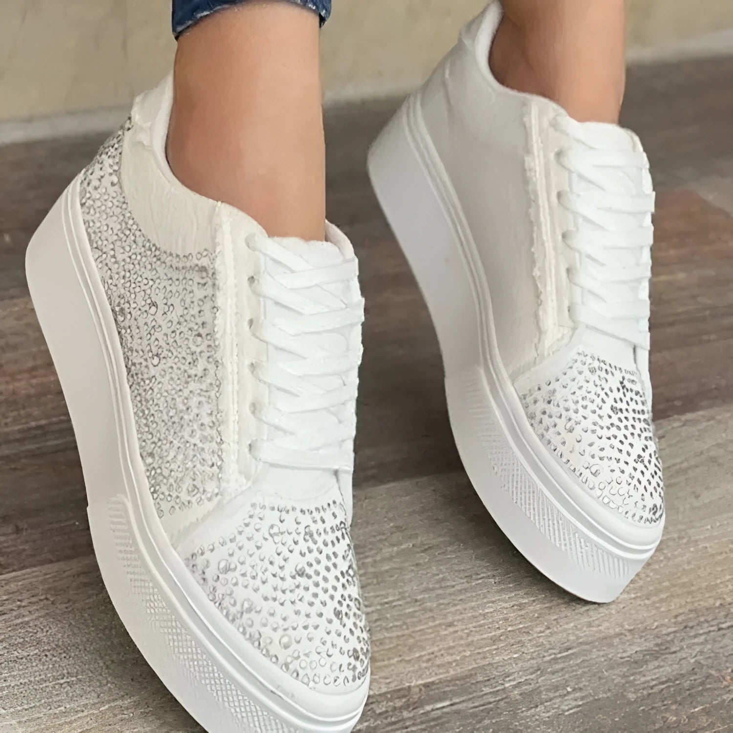 Plus size women's rhinestone casual sports shoes in black with a chunky flat rubber sole and front lace-up.