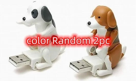 USB dancing dog toy in random colour made from ABS plastic on a desk