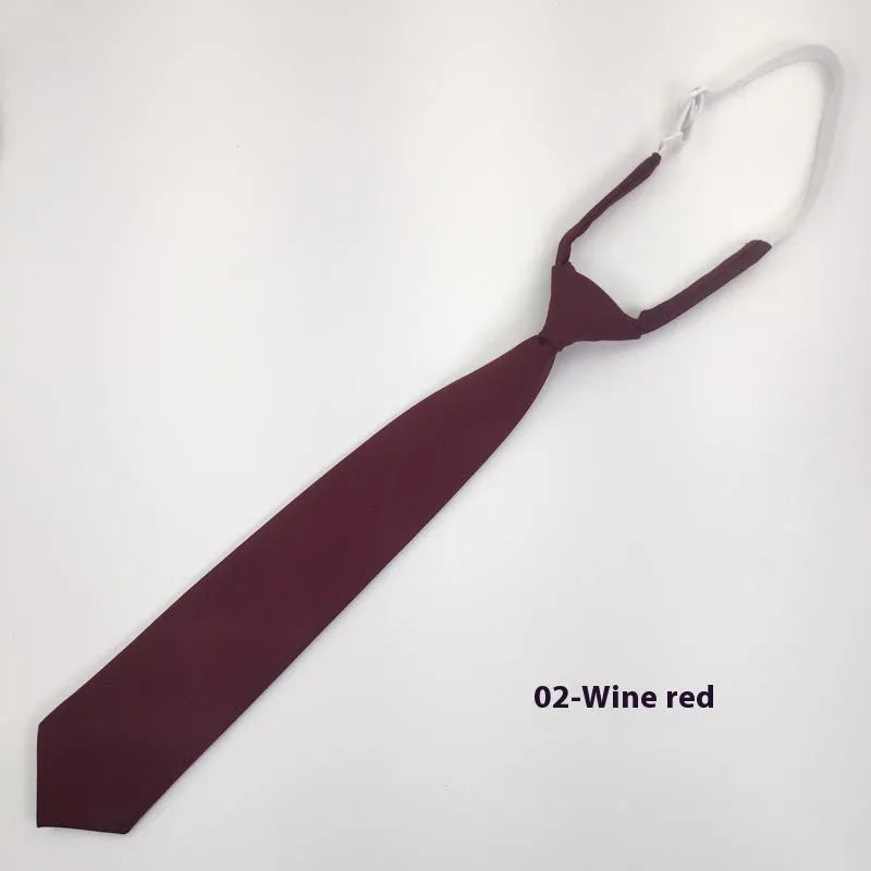 Men's solid colour cotton arrow style bow tie in navy blue.