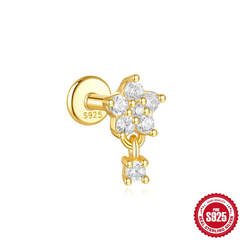 S925 sterling silver geometric moon and star earrings with diamond detail on a gold tone background.