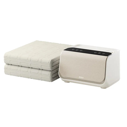 Aideng white electric water blanket with plush surface and smart host unit on a bed.