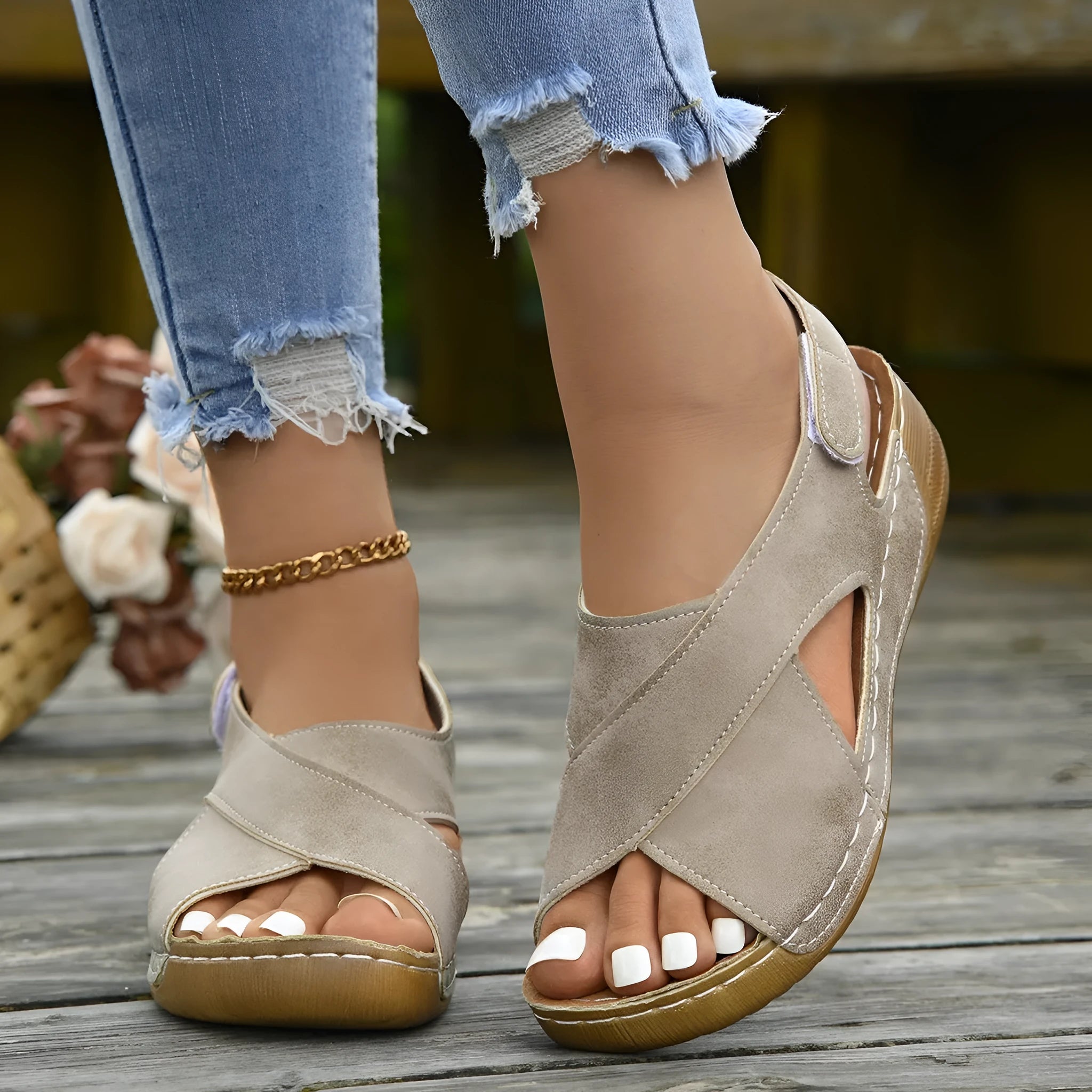 Roman platform sandals with ankle skirt and adjustable Velcro straps in a khaki colour.