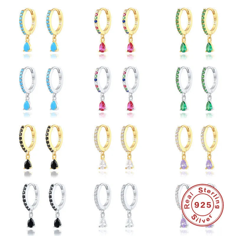 S925 sterling silver water drop shaped earrings with a gemstone accent on a gold or silver background.