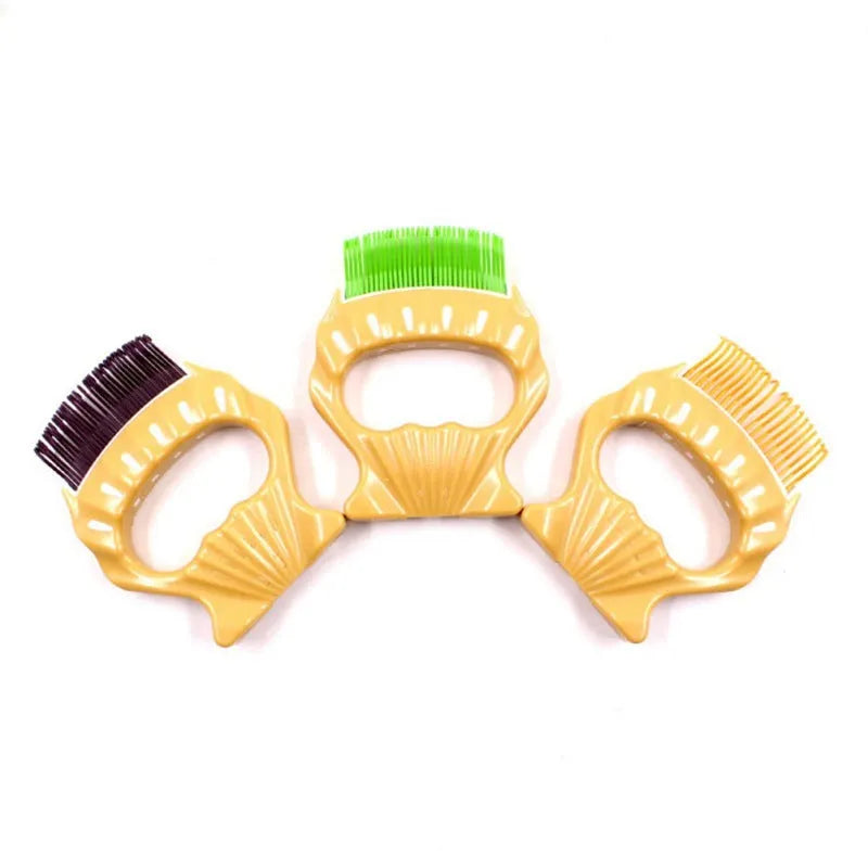 Shell-shaped plastic pet grooming brush with bent wire bristles in green, orange, or purple colours
