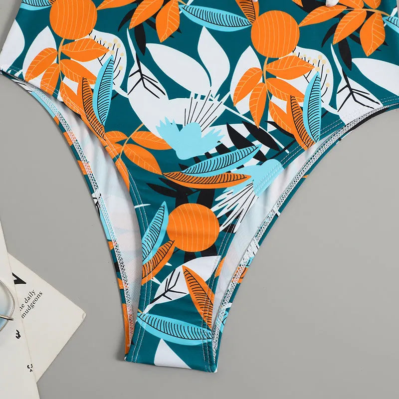 Women's high waist one-piece swimsuit in a printed pattern, shown in black and white colour options.