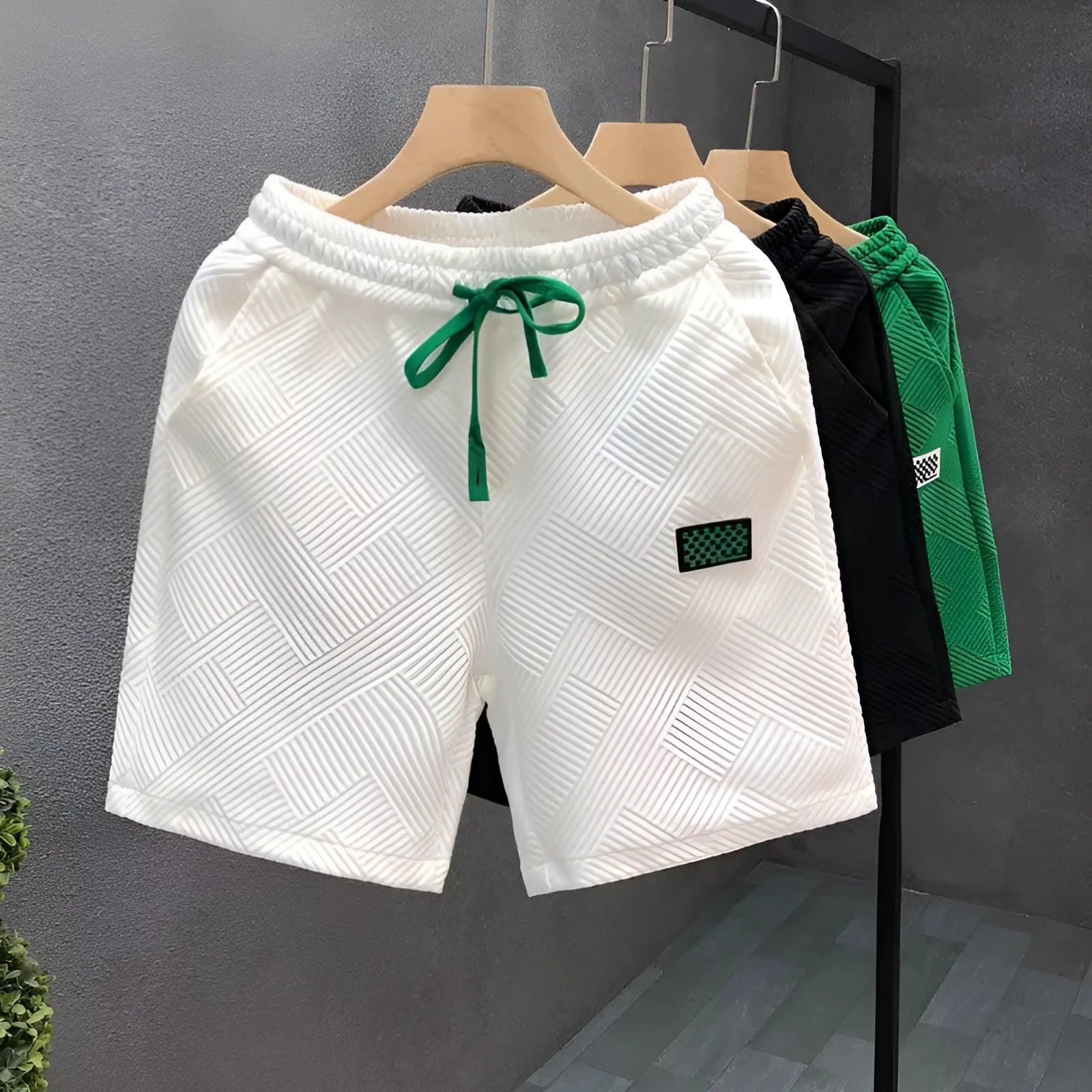 Polyester sports shorts in solid colours with micro elasticity for casual wear and beach activities