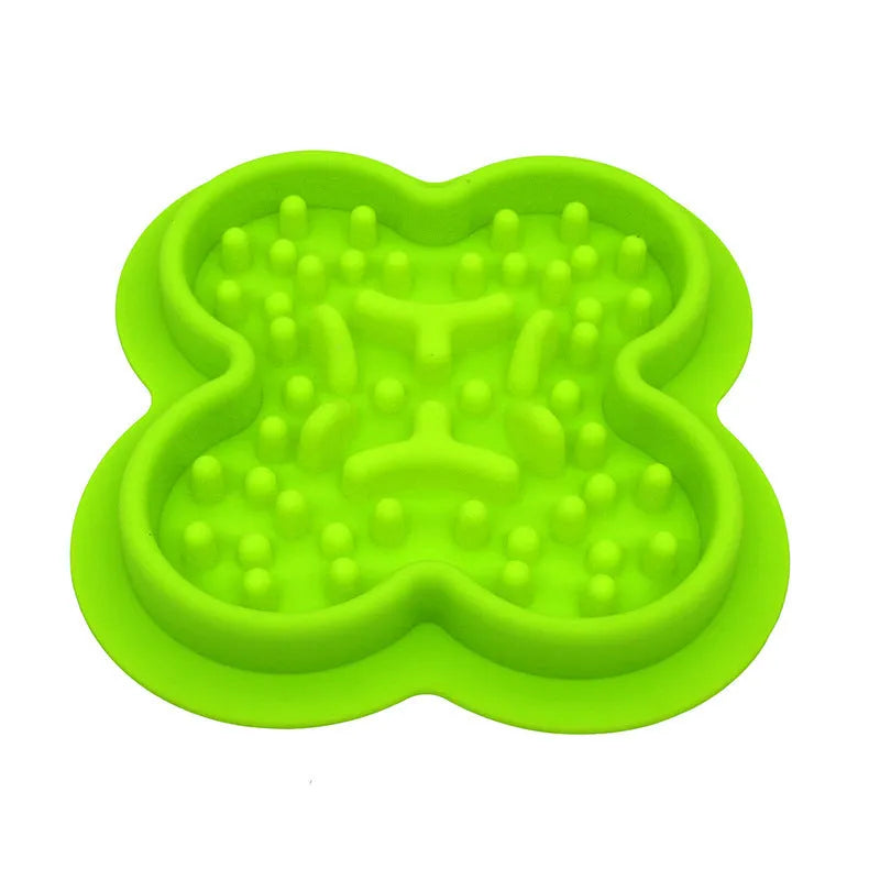 Silicone pet licking pad slow feeder mat in green colour with textured surface, showing scale.
