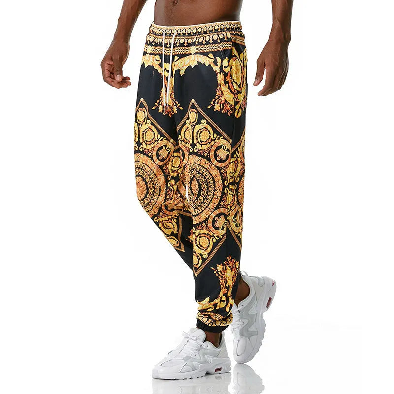 Printed jogging pants in loose fit with drawstring waist, small leg opening, and ribbed hem, available in multiple colours