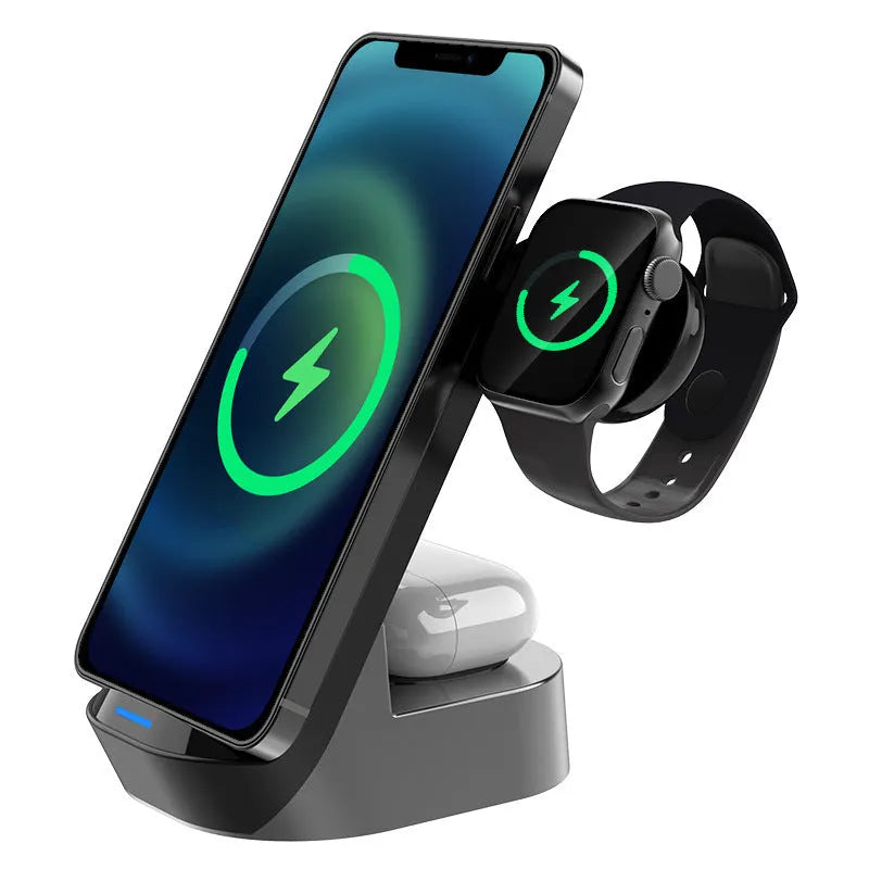 Black-grey foldable 3-in-1 wireless charging stand holding a phone, smartwatch, and earbuds case upright.