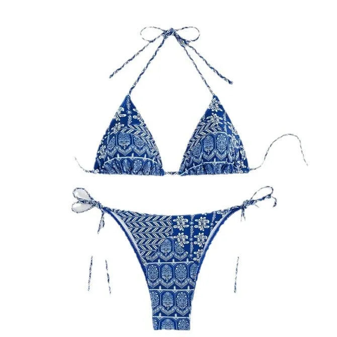 Women's green split bandage bikini with printed stitching on a mannequin.