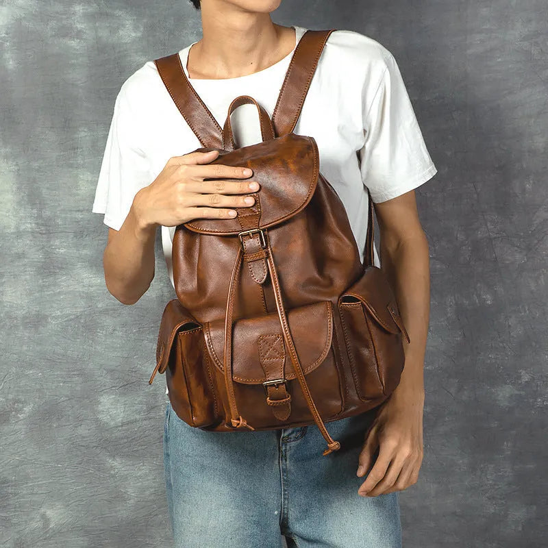 Genuine leather retro backpack for men in light brown with geometric pattern and contrast stitching