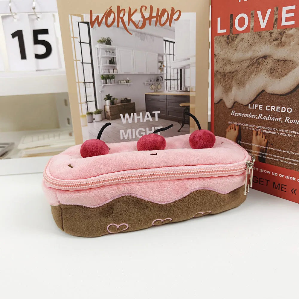 Cherry cake pattern plush velvet pencil case with a zip closure.