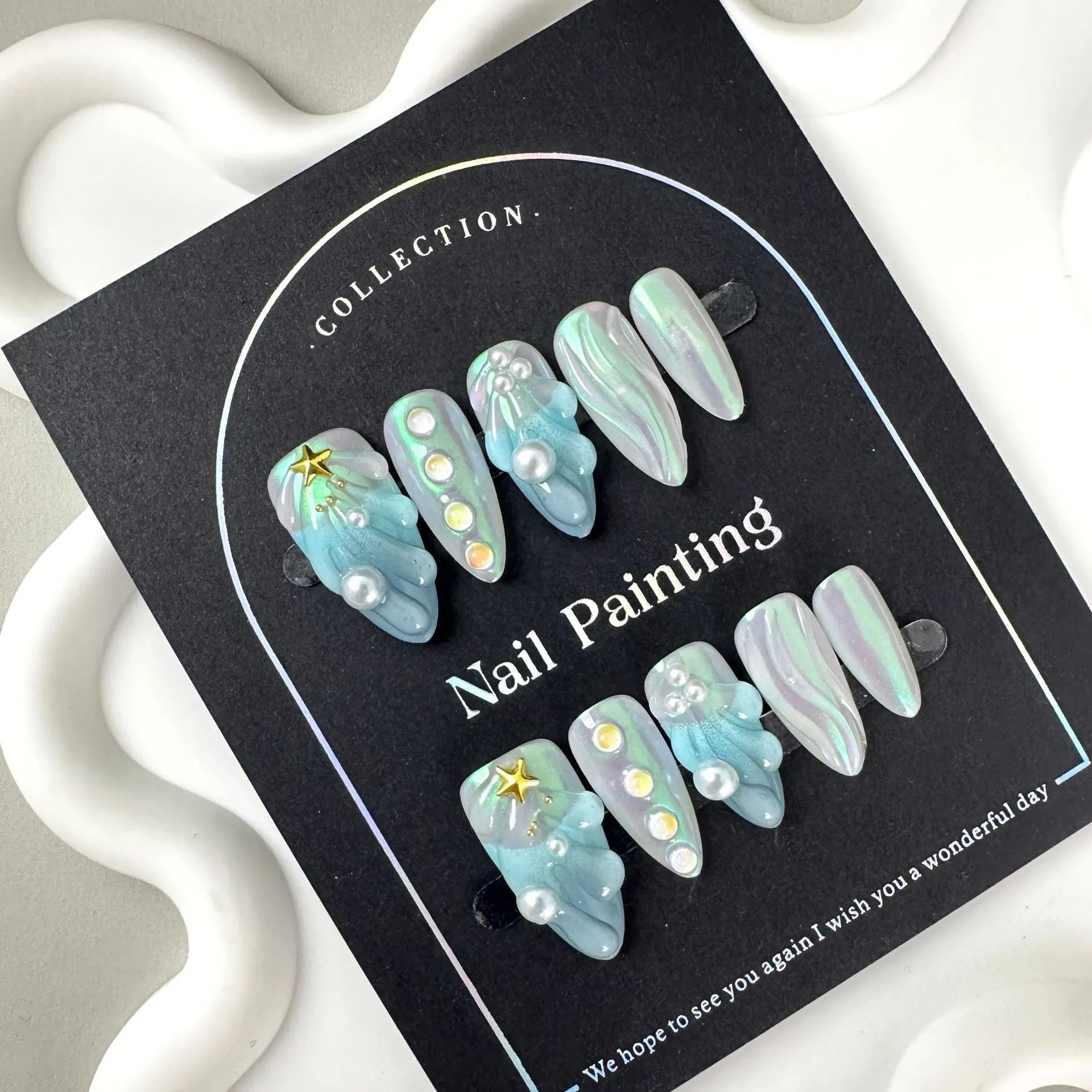 HAILANG blue shell design plastic false nail tips set in XS, S, M, L sizes