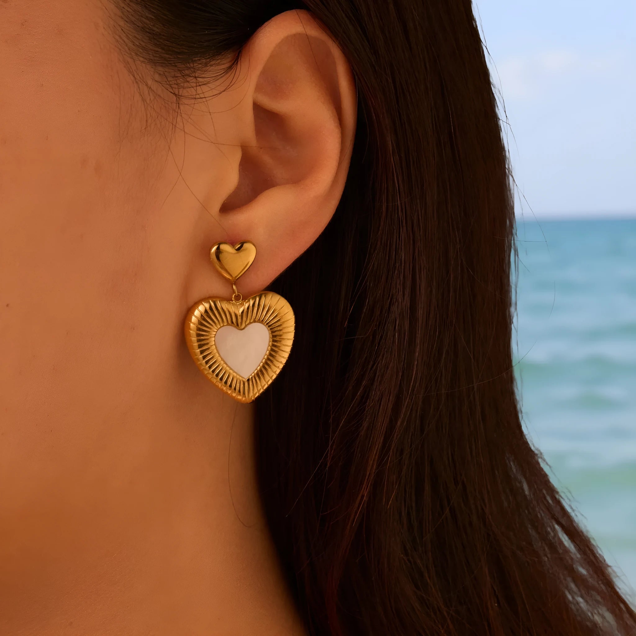 Gold-colour electroplated heart earrings with fritillary detail on stainless steel