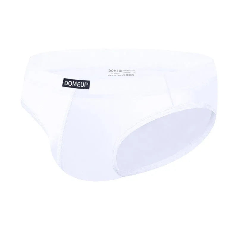 Men's solid colour low waist seamless briefs in white, black, and pink on a size chart.