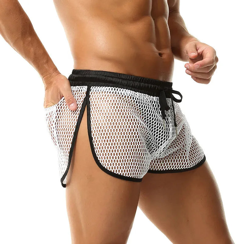 Men's solid colour loose boxer shorts in black, white, gray, or red on a size chart