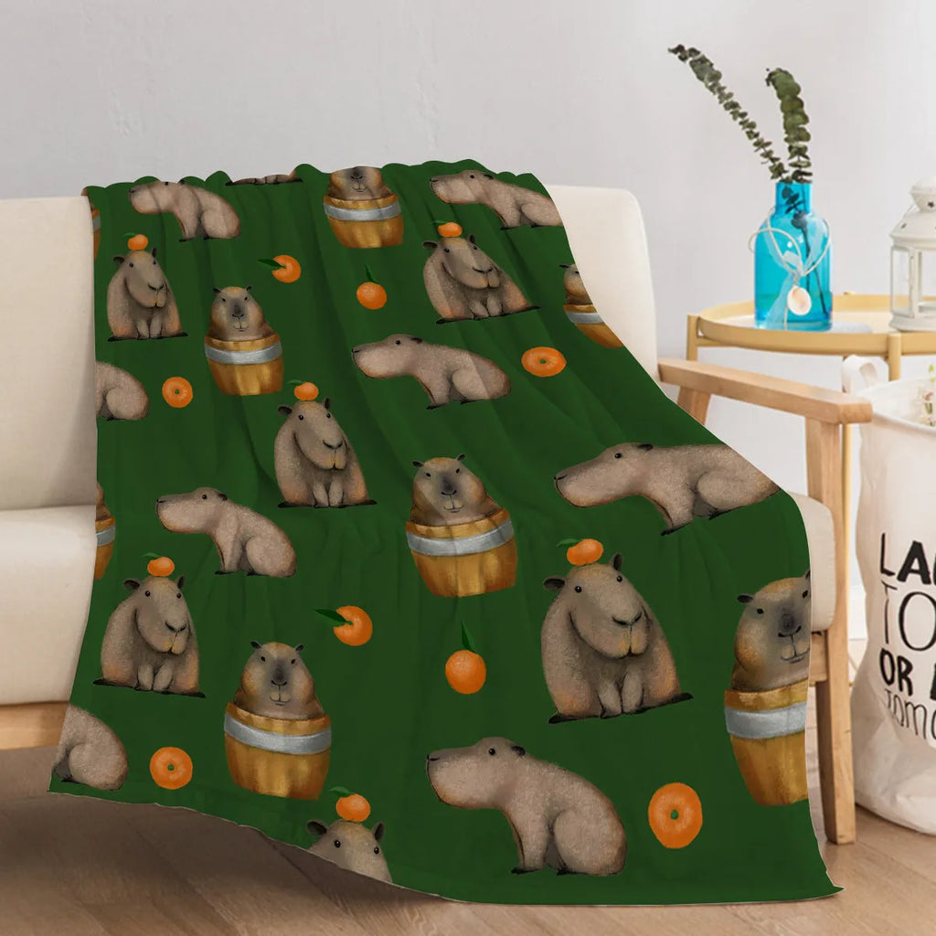 Orange and capybara pattern flannel fleece blanket in multicolour, soft fluffy throw for sofa, bed, camping and office naps