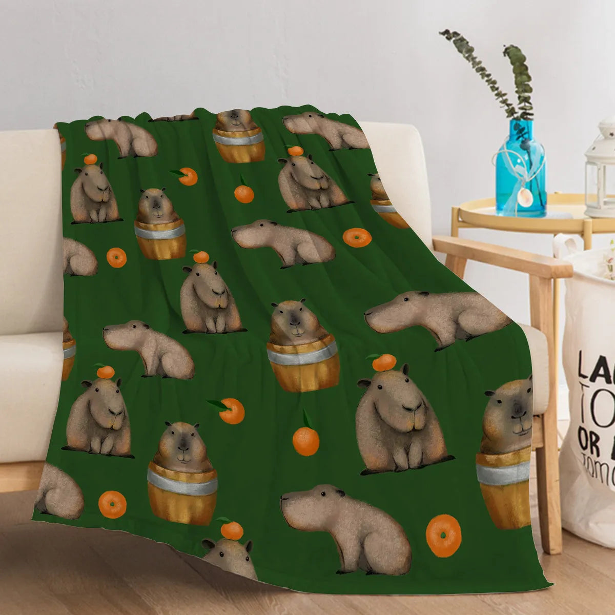Orange and capybara pattern flannel fleece blanket in multicolour, soft fluffy throw for sofa, bed, camping and office naps
