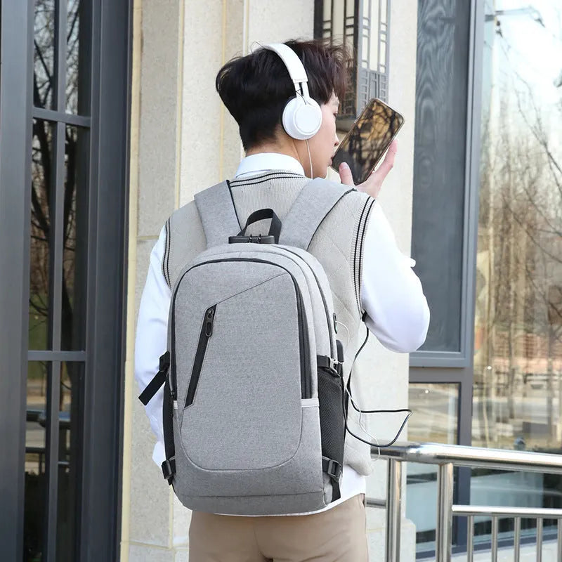 Oxford cloth computer backpack in blue, shown with street style design and laptop compartment.